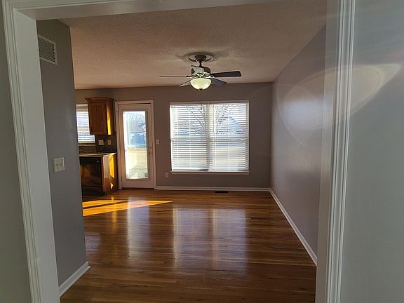 Eat-in kitchen leading to back patio.