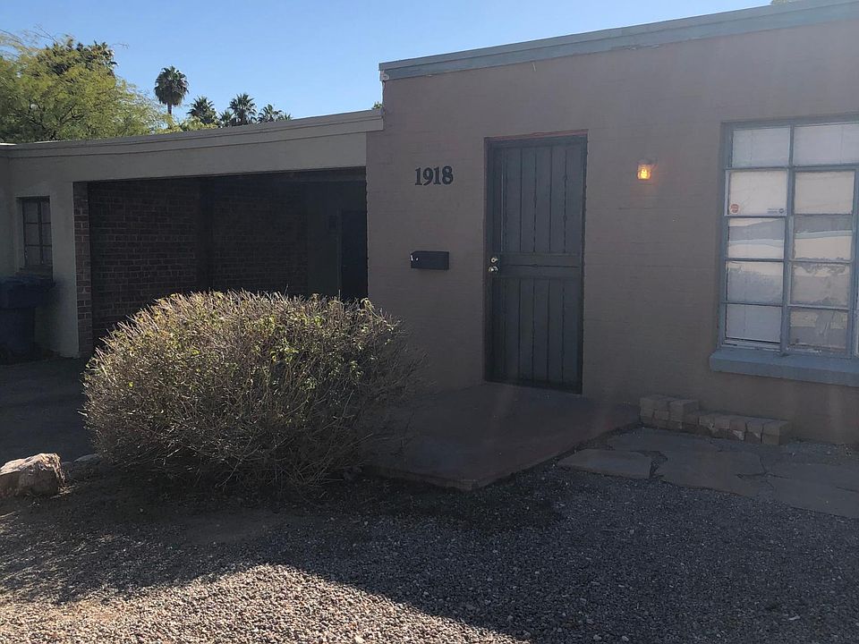 Front of home with shared carport. Room for another vehicle off street.