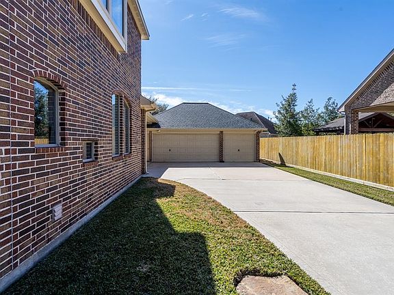 The driveway leads to a 3-car detached garage and an area that provides ample parking for all! It would even serve as an overflow area for play dates or crawfish boils with friends and family!