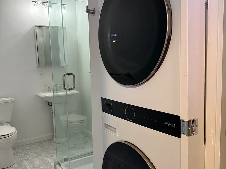 Bathroom with washer dryer