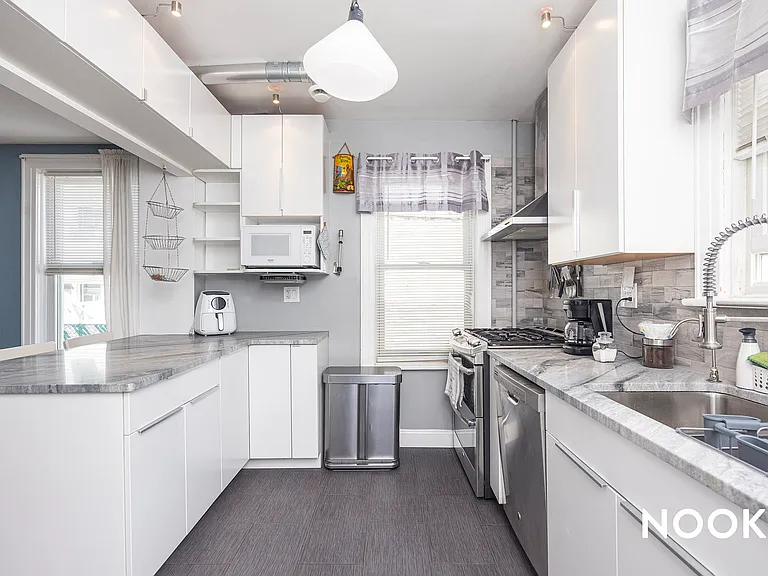 61-11 64th St #1B — Photo 1