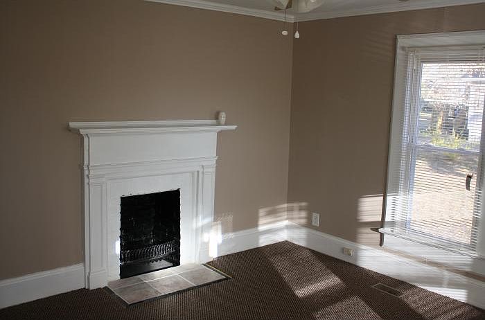Large den with fireplace