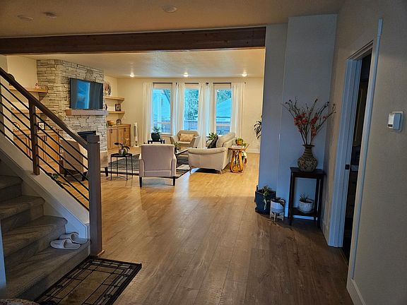Hallway leading to upstairs and great room.