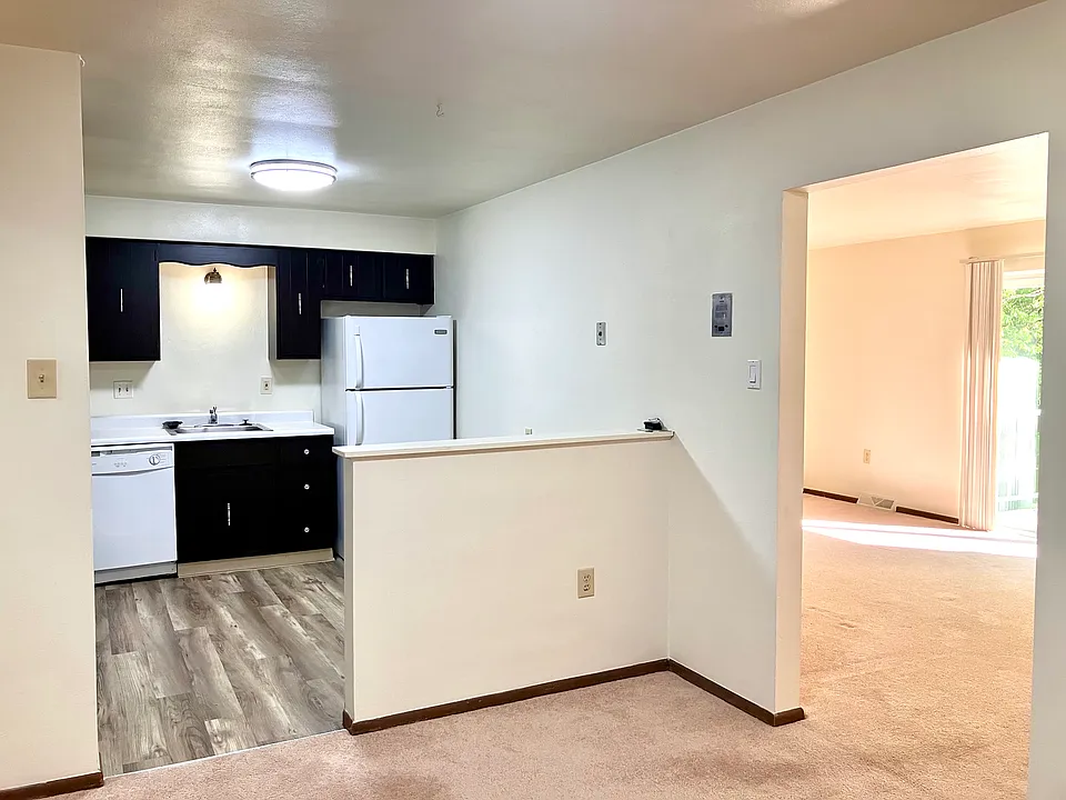 kitchen, dining room, living room to right