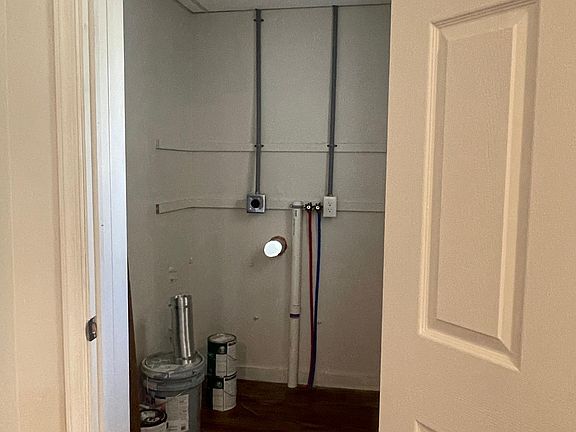 Laundry room with stackable washer and dryer hookup