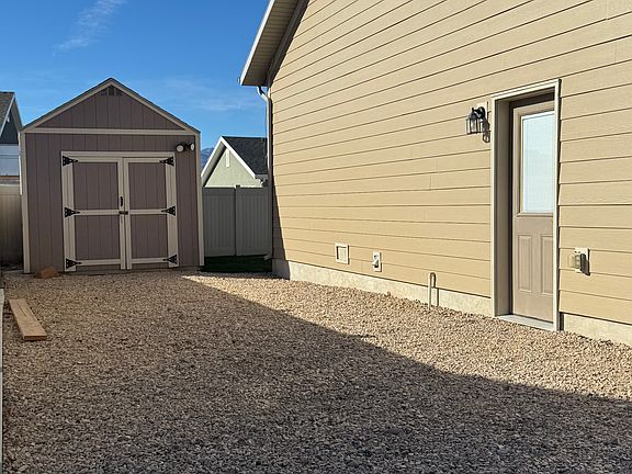 Garage Side RV Parking & 10x16 Shed