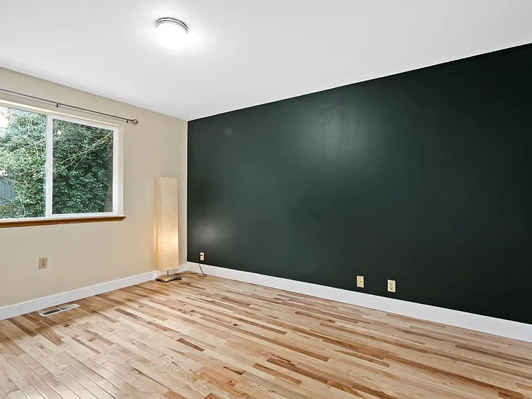Master bedroom with accent wall