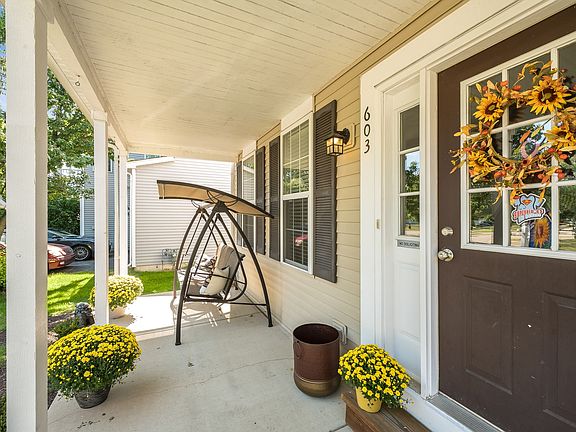 Imagine the hours you would spend on this front porch!