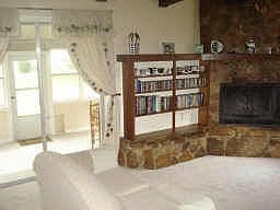 Spacious family room with dramatic fireplace!
