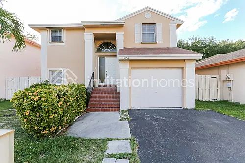 3856 NW 107th Way Photo 1