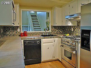 Stainless Steel Appliances and Tile