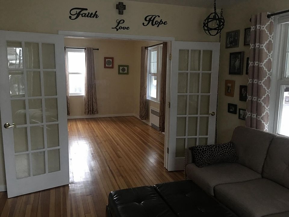 Living room looking into bedroom