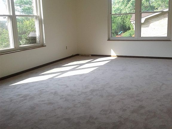 Living room...windows on left have mountain view...your one neighbor is through the window on right. Only other near neighbor is well behind house.