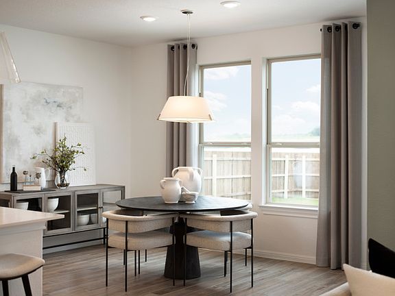 Spacious Dining Area with Backyard Views