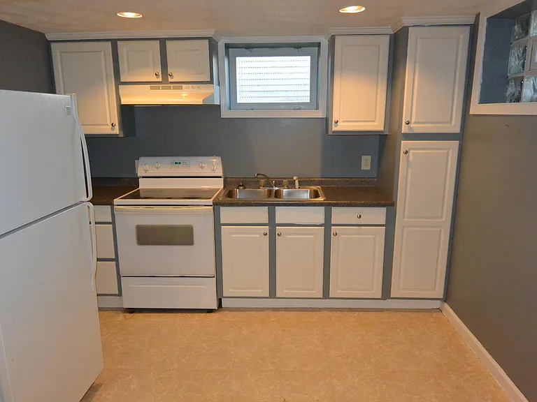 Lower level second kitchen.