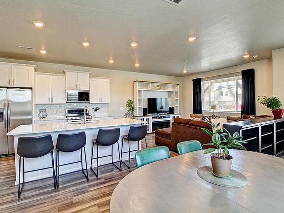 Dining area. Kitchen. Living room.