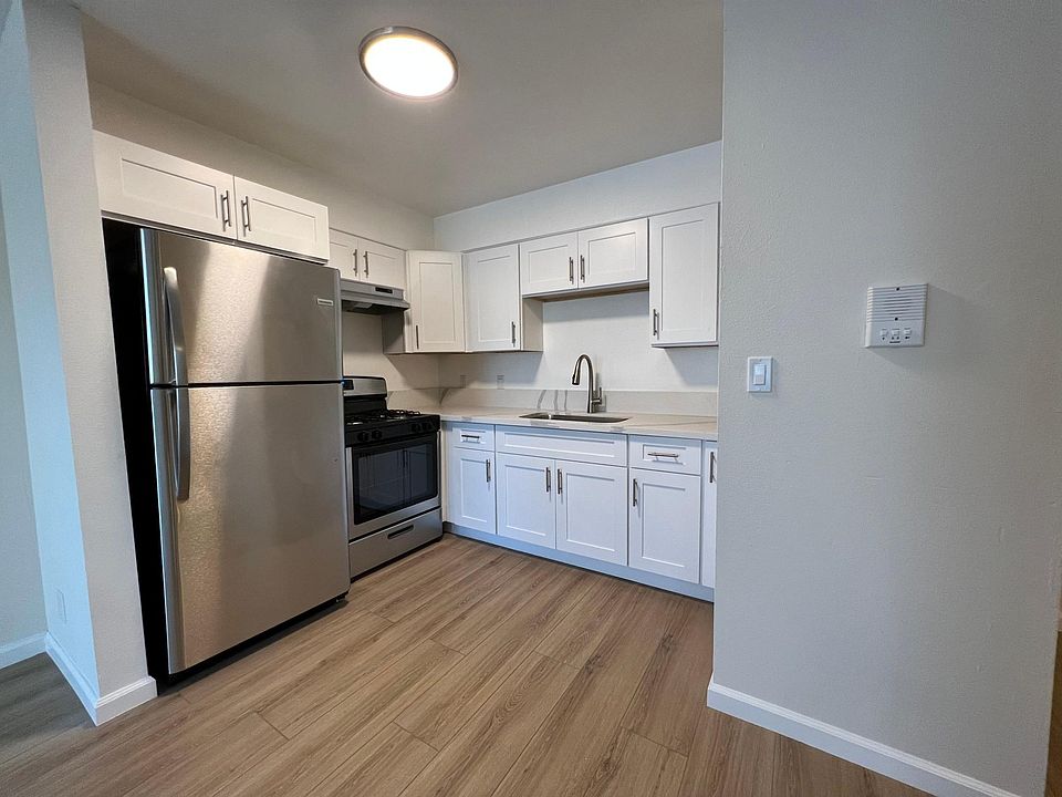 Kitchen with brand new, stainless steel appliances!