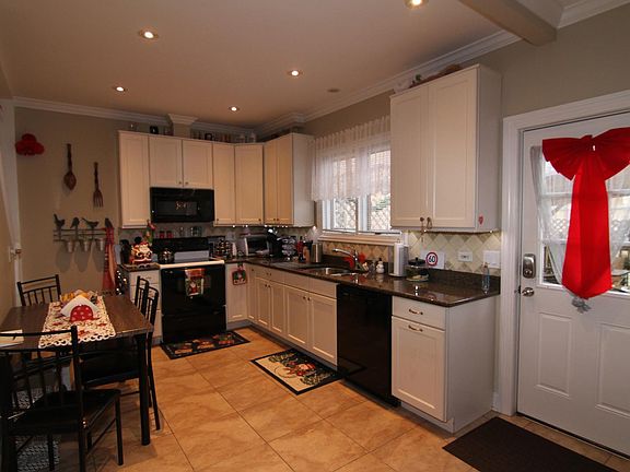 4th image of 9818 Schiller Blvd
