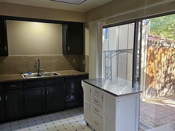 Kitchen with additional access to patio.