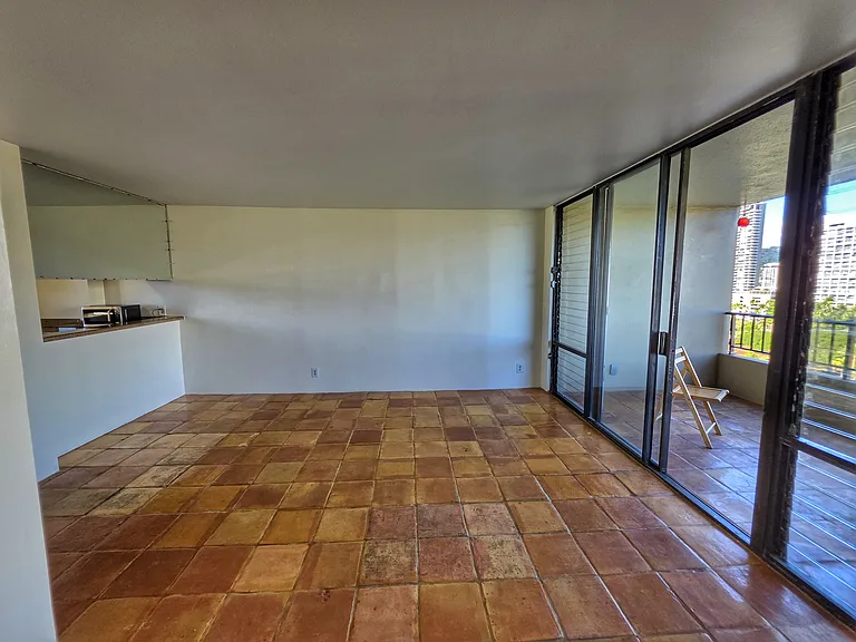 Living room flowing into the large lanai.