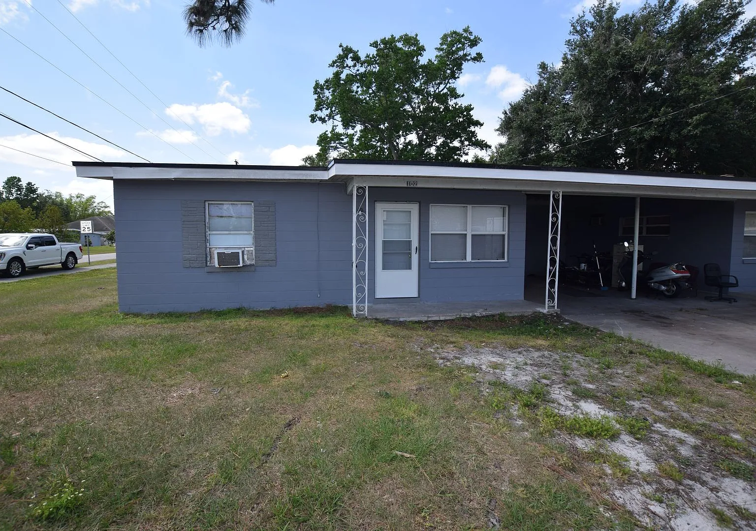 2 Bedroom 1Bath Duplex For Rent at 102 W Lancaster Road Orlando, FL 32809 — Photo 1