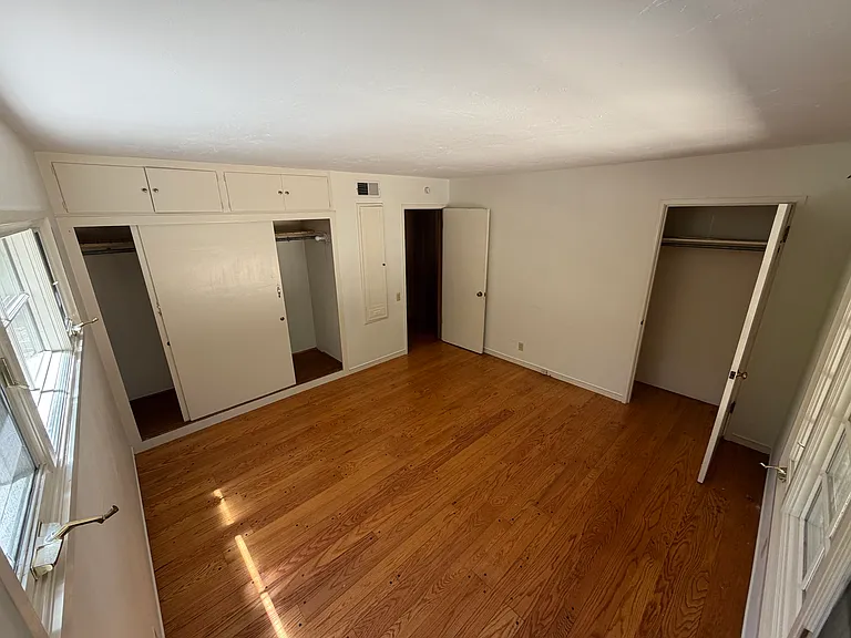 Bedroom #2 with ample storage closets