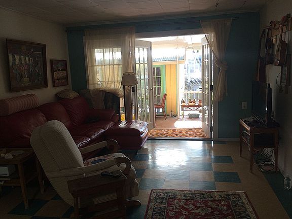 living room w view of lanai 