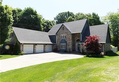 This home is custom built & ready for a new owner. Well maintained 3 bedroom, 2 1/2 bath, basement, great room, open concept living plus in ground pool. Enjoy the wooded, peaceful setting.