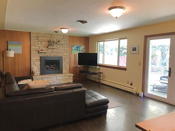 Living Room - gas fireplace, walk out to covered back patio