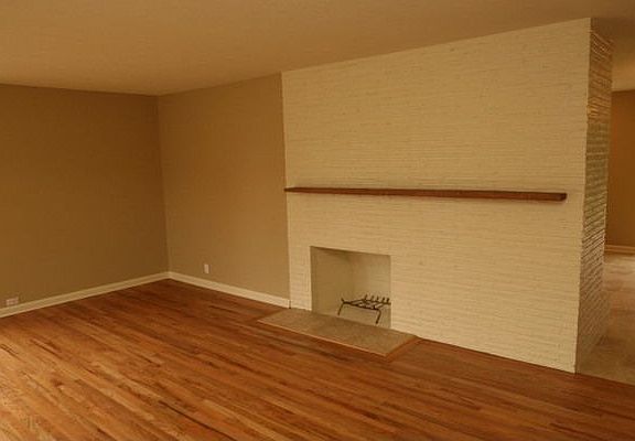 Living room w/fire & hardwoods