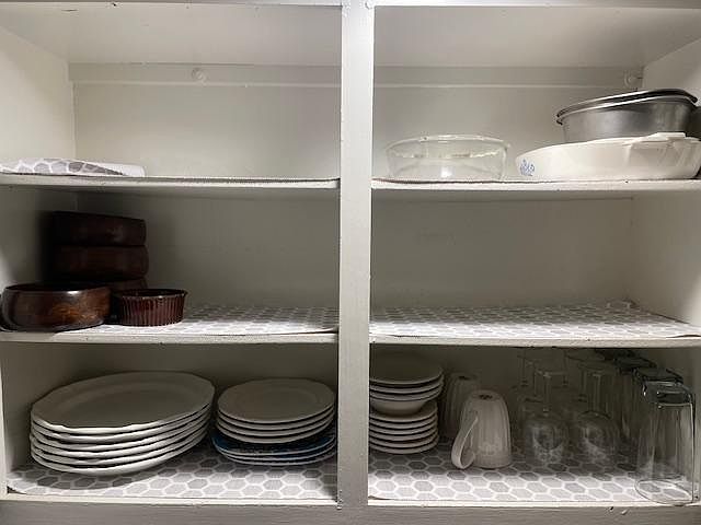 Kithcen comes with utensils, plates, glassware.