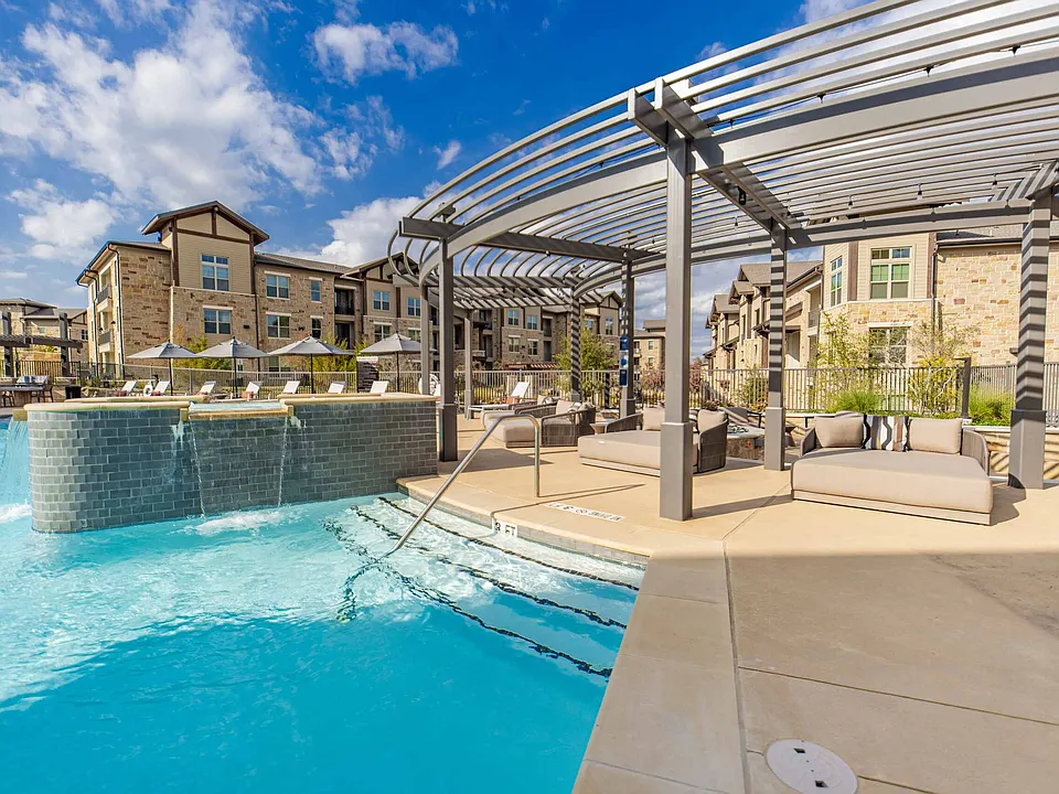 The Preserve pairs pool time with shaded seating beside the water.