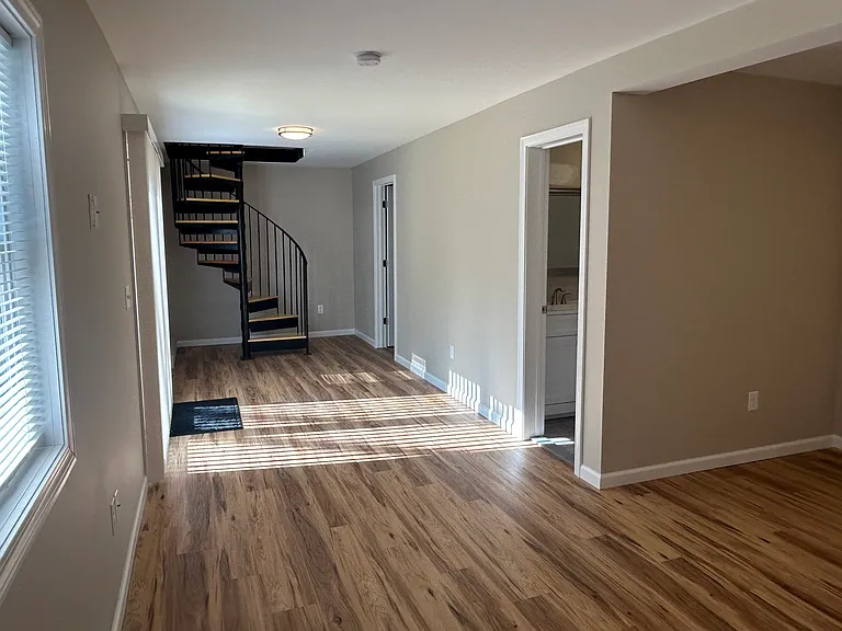 Far right door leads to laundry room and storage area