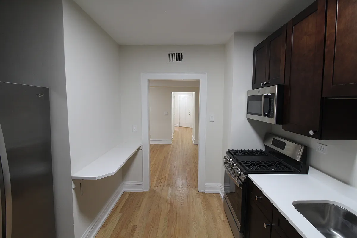 Building Photo - 6307 N Mozart St #1N