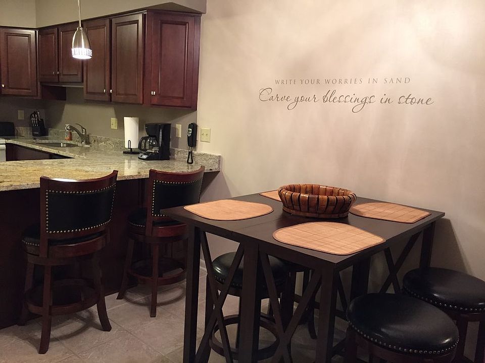 Dining room pub table with 4 stools.