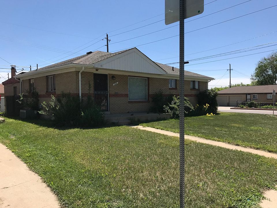 Brick home on corner lot. The backyard is fenced for privacy and play