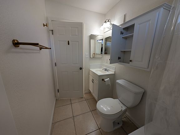 Double towel bar, hooks and hand towel bar and bathroom cabinet storage space