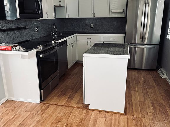 2nd image of 9437 W 56th Pl #A