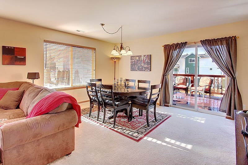 dining room with slider to deck