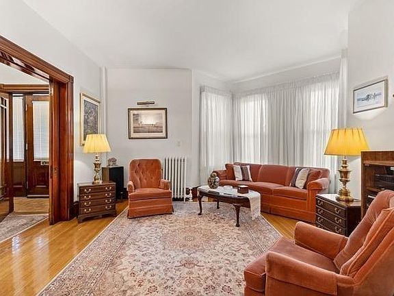 Main living room and front entrance to apartment
