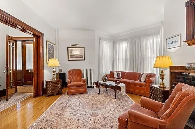 Main living room and front entrance to apartment