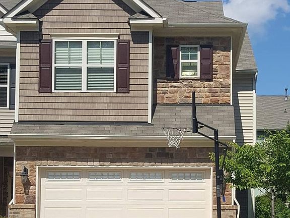 Basket ball hoop for future tenant on the drive way.