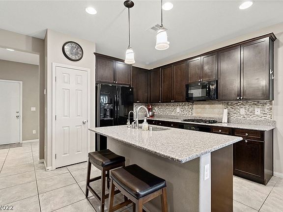 4th image of 6935 Yellow Cosmos Ave