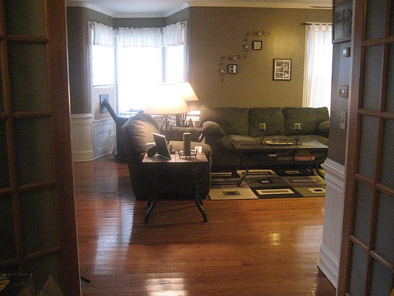 looking out bedroom 2 into living room