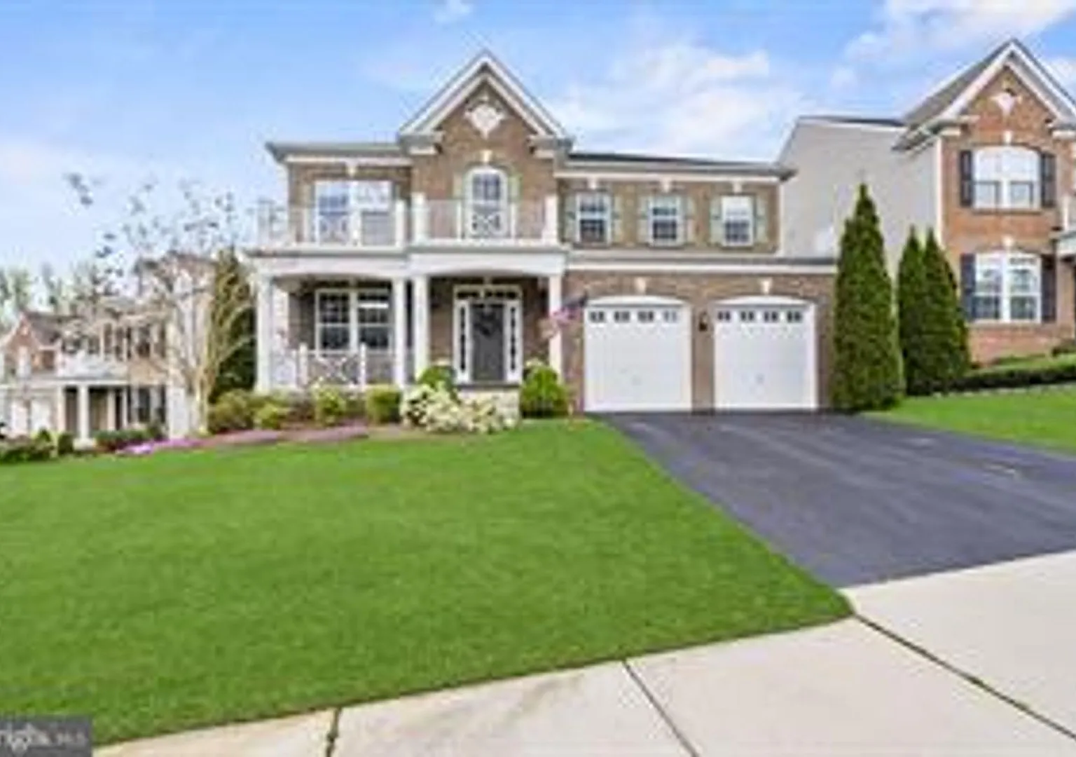 This beautifully maintained single-family home offers five bedrooms, four-and-a-half bathrooms, a... — Photo 1