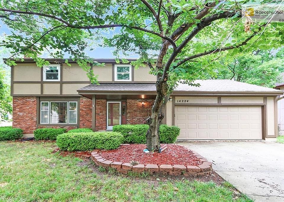 Beautiful two story home with 4 bedrooms, 2 1/2 baths, a finished basement, screened in porch and paver patio.