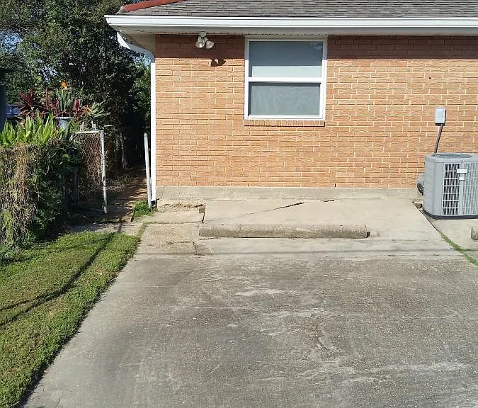 back of rental with one parking spot