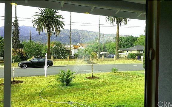 Stunning view from the oversized brand new living room window of the SG mountains
