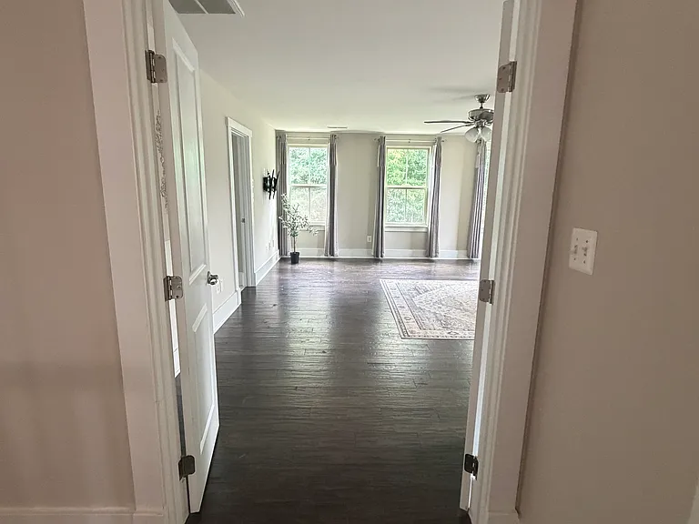 Welcoming entryway to the spacious primary suite.