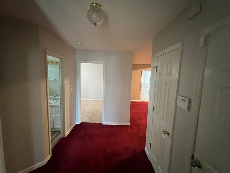 Entering the door: bedroom (1) and (2), plus full bath (1). Garage, closet and living space to the right.